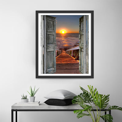 Coucher de Soleil sur la Mer devant la Porte en Bois Broderie Diamant