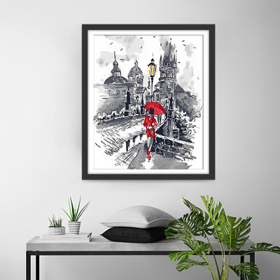 Femme avec Parapluie Rouge en Ville Broderie Diamant