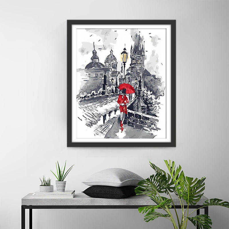 Femme avec Parapluie Rouge en Ville Broderie Diamant