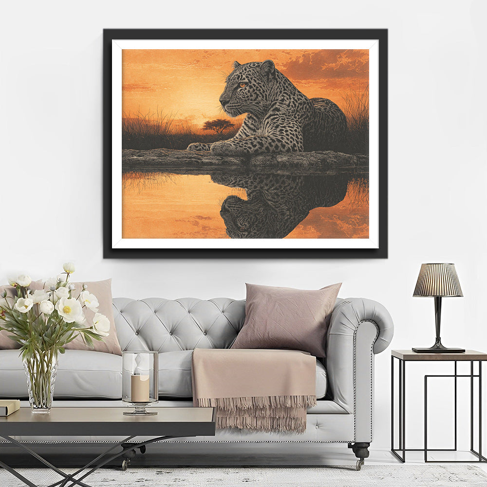 Un Léopard Couché au Bord du Lac au Crépuscule Broderie Diamant