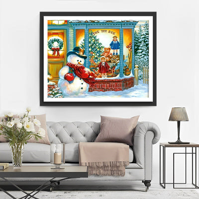 Bonhomme de Neige devant la Vitrine Broderie Diamant