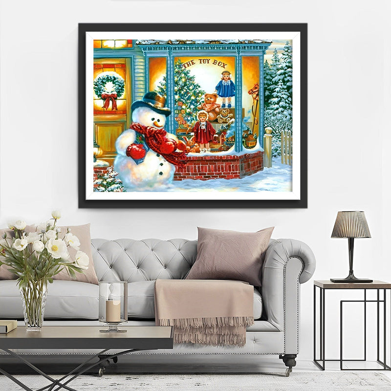 Bonhomme de Neige devant la Vitrine Broderie Diamant