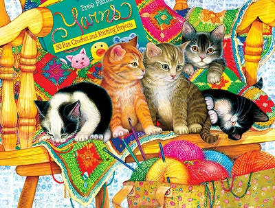 Chatons sur la Table de Tricot Broderie Diamant